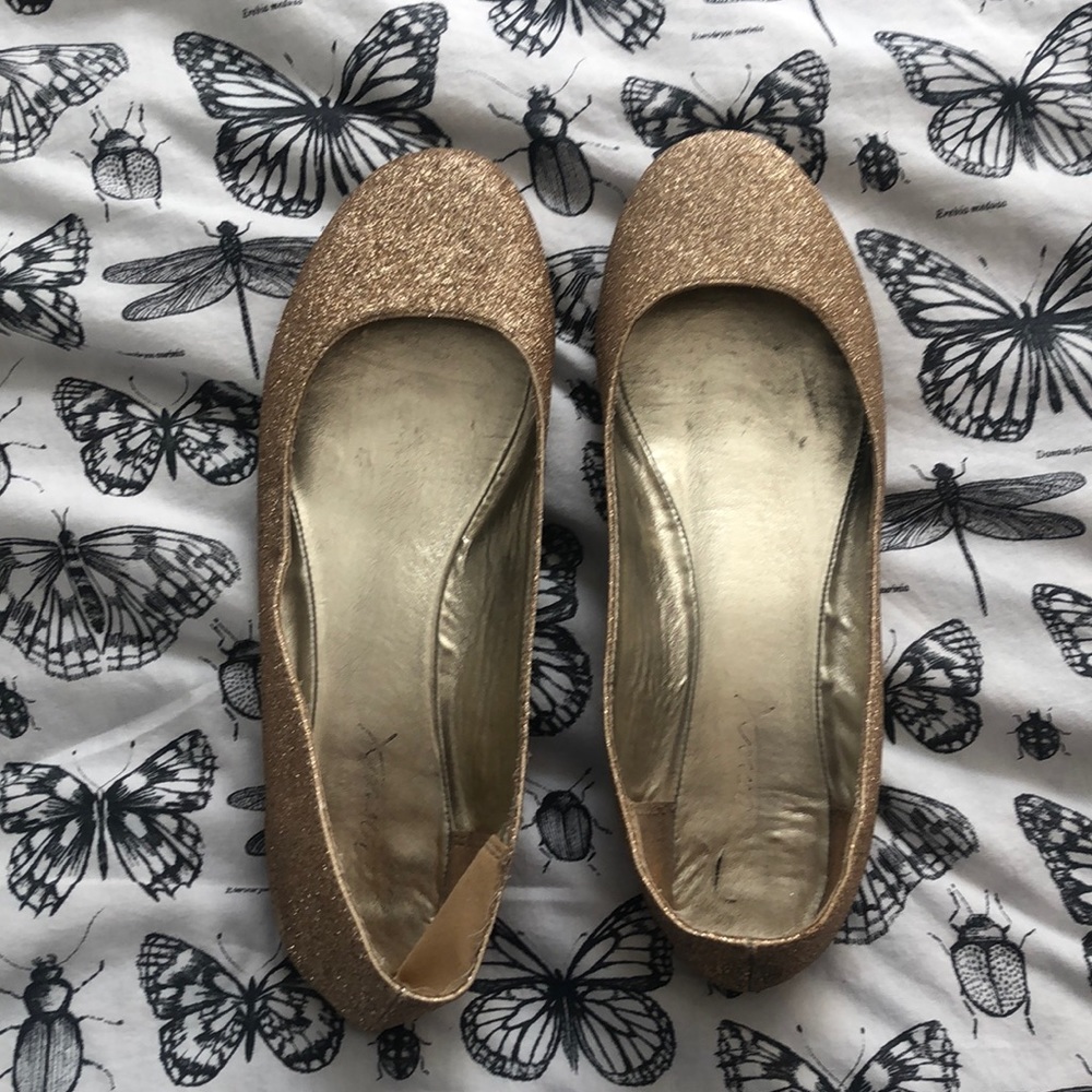 Gold, glittery flats